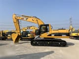 2012 Caterpillar 325CL crawler excavator, side profile view