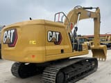2023 Caterpillar 320GC crawler excavator, rear three-quarter view