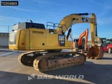 2018 Caterpillar 352F crawler excavator, rear three-quarter view