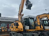 2024 Liebherr A916 Compact wheel excavator, front three-quarter view
