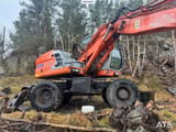 2003 Kobelco E175W Evolution wheel excavator side view