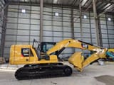 2023 Caterpillar 320GC crawler excavator, side view