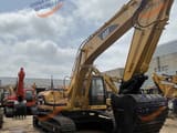2016 Caterpillar 325BL crawler excavator, side view
