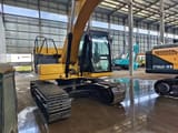 2023 Caterpillar 320GC crawler excavator, rear three-quarter view