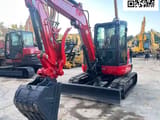 2023 Kubota KX057-4 mini excavator, front three-quarter view