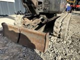 2018 Bobcat E08 mini excavator front view of blade and tracks
