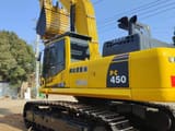 2023 Komatsu PC450 crawler excavator, rear three-quarter view