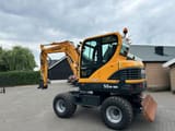 2018 Hyundai 55W-9A wheel excavator, rear three-quarter view