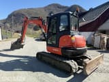 2017 Kubota KX057-4 mini excavator, rear three-quarter view