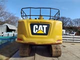 2018 Caterpillar 320-07A crawler excavator, rear view