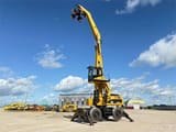 2010 Caterpillar M325D MH wheel excavator, side view