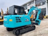 2023 Kobelco SK60 crawler excavator, rear three-quarter view
