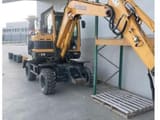 2016 Hyundai R55W-9A wheel excavator, side view