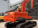 2022 Doosan DX225LC-9C crawler excavator, rear three-quarter view