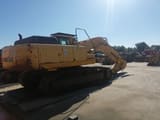 Komatsu PC340NLC-7 crawler excavator, rear three-quarter view