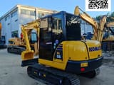2022 Komatsu PC56 mini excavator, rear three-quarter view