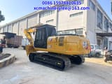 2024 Caterpillar 320GC crawler excavator, rear three-quarter view