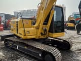 2022 Komatsu PC120 crawler excavator, rear three-quarter view