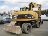 Pelle sur roues Caterpillar M313C de 2003