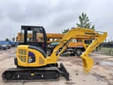 2024 Komatsu PC-55MR mini excavator, side view