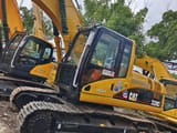 Гусеничний екскаватор 2023 Caterpillar 320CL, вид збоку