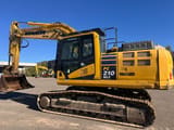 2019 Komatsu PC210 NLC-11 excavator side view