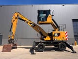 2017 Caterpillar MH3022 material handler side view