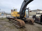 2006 Volvo EC210BLC crawler excavator, rear three-quarter view