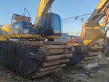 2019 Caterpillar 320C amphibious excavator, side view