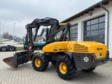 2010 Mecalac 12MTX wheel excavator, side view