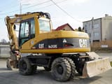 Pelle sur roues Caterpillar M313C de 2003