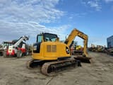 2015 Caterpillar 308E mini excavator, rear three-quarter view