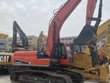 2022 Doosan DX225LC-9C crawler excavator, side view