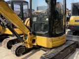 Caterpillar 303.5 Mini Excavator, front three-quarter view