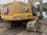 2021 Caterpillar 320GC crawler excavator, rear three-quarter view