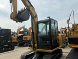 2024 Caterpillar 305.5E2 mini excavator, front three-quarter view
