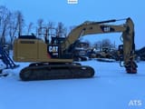 2012 Caterpillar 324E crawler excavator, side view