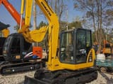 2024 Komatsu PC56 excavator, front three-quarter view
