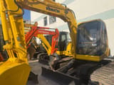 2020 Komatsu PC60 crawler excavator, front three-quarter view