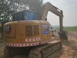 2023 Caterpillar 307E2 mini excavator rear three-quarter view