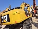 2024 Caterpillar 320D2 Raupenbagger, Ansicht von hinten dreiviertel