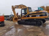 2012 Caterpillar 320BL crawler excavator, side view