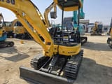 2024 Komatsu PC35 mini excavator, rear three-quarter view