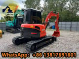 2024 Kubota U55-4 mini excavator, rear three-quarter view
