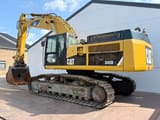 2010 Caterpillar 345DL crawler excavator, side view