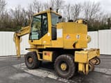 1997 CASE 788-PRR wheel excavator, rear three-quarter view
