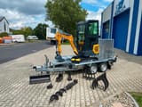 Mini excavator BK1250KSR on trailer with accessories