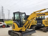 2021 Komatsu PC35MR mini excavator, front three-quarter view