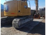2020 Caterpillar 325 crawler excavator, rear three-quarter view
