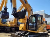 2011 Caterpillar 312C crawler excavator, front three-quarter view